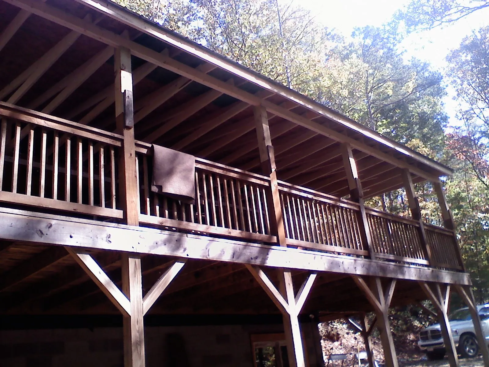 Timber framing under a new elevated porch and deck — Roof Leak Repair in Peoria by Roofing Brothers